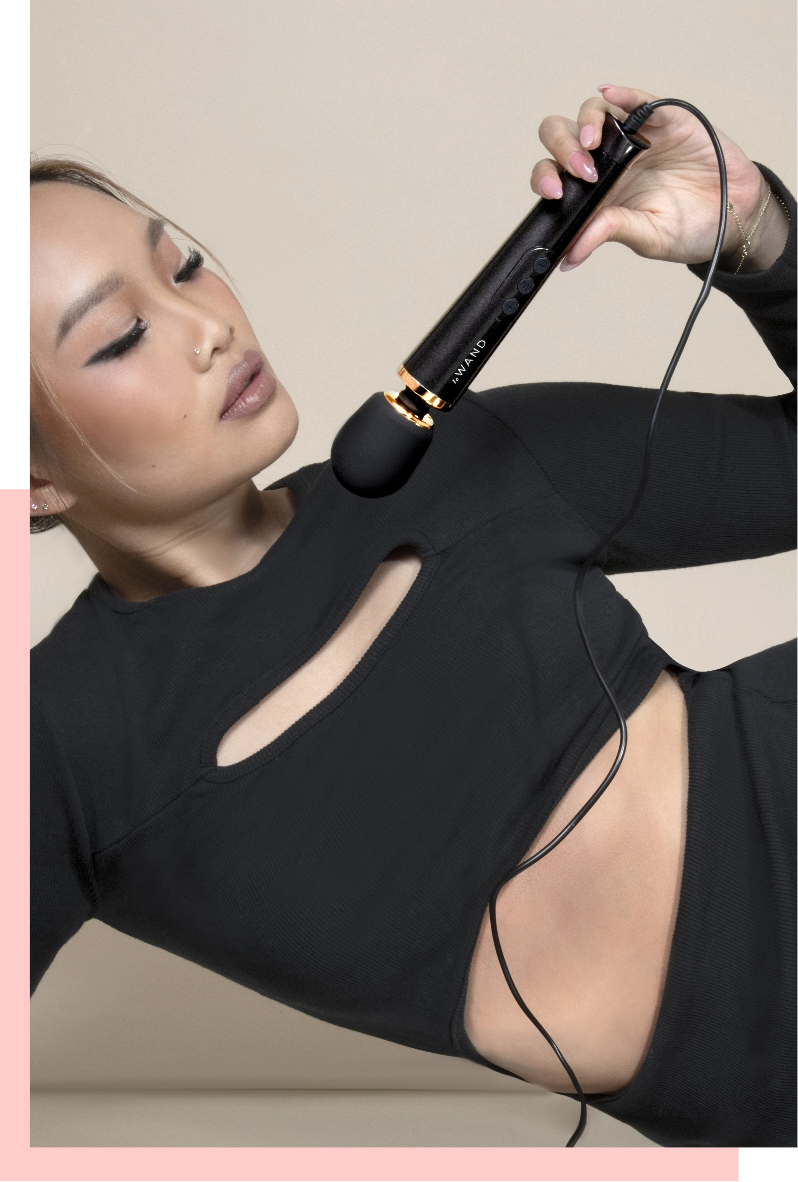 Le Wand Petite Rechargeable Vibrating Massager in Blue, Rose gold, and Violet