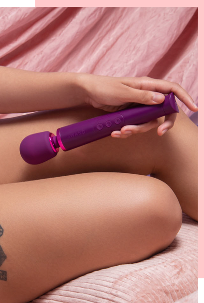 Le Wand Petite Rechargeable Vibrating Massager in Blue, Rose gold, and Violet