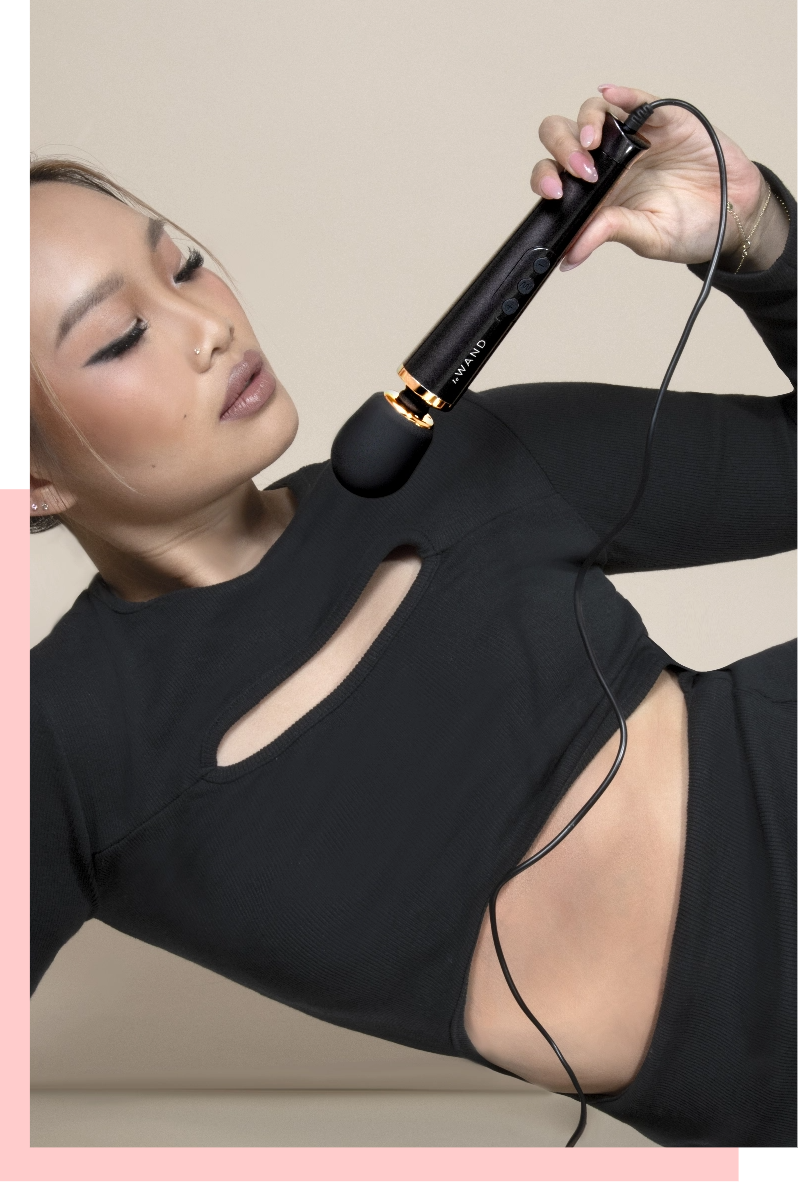 Le Wand Petite Rechargeable Vibrating Massager in Blue, Rose gold, and Violet
